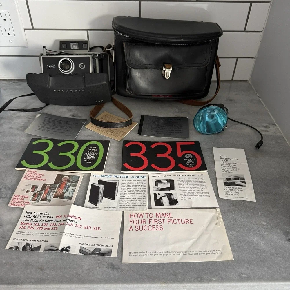 Vintage Polaroid 335 Automatic Land Camera Leather Case, Flash, Manuals Extras‎
